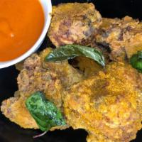 Mardas Fried Chicken · Buttermilk fried chicken, madras curry spice, thai basil, house spicy dipping sauce.