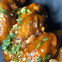 Bt Spicy Chicken Wings · (Gluten Free) Chili, palm sugar, house hot sauce, peanuts, cilantro, lime.