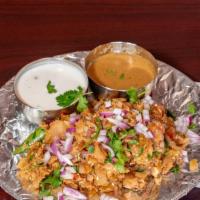 Chicken Kothu Parotta · Roasted paratha shredded into bite pieces and stir fried with chicken along with vegetables ...
