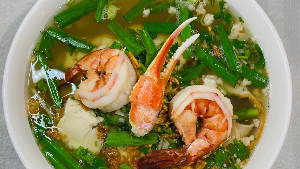 48. Hủ Tiếu Đà Lạt Đặc Biệt · Rice Noodle Soup with Jumbo Shrimp, Crab Leg & Meat (Due to supply chain issues, we will replace crab leg with prawn instead if crab leg is not available)