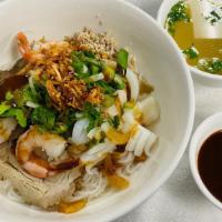 46. Hủ Tiếu Dai Đà Lạt Đặc Biệt · Clear Noodle Soup with Jumbo Shrimp (Due to supply chain issues, we will replace crab leg wi...