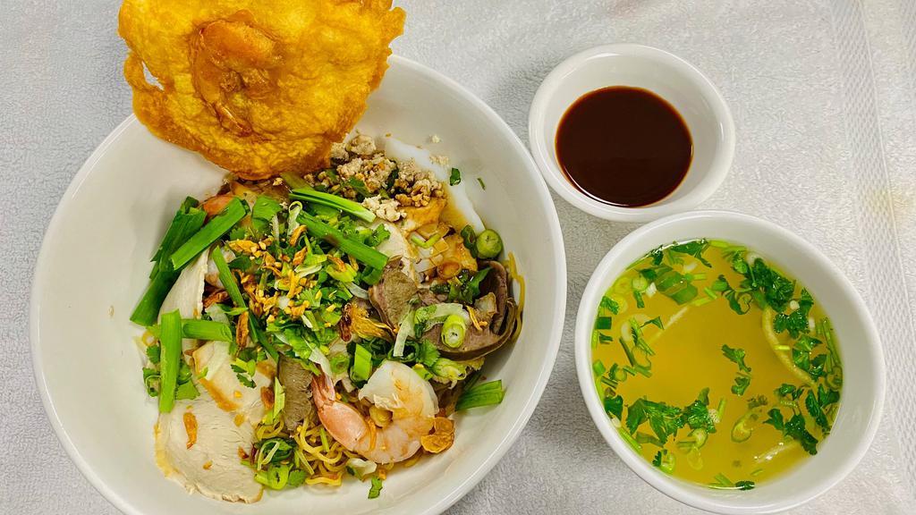 59. Mi` Đa` Lạt Đặc Biệt · Egg Noodle Soup with Jumbo Shrimp, Crab Leg & Meat
(Due to supply chain issues, we will replace crab leg with prawn instead if crab leg is not available)