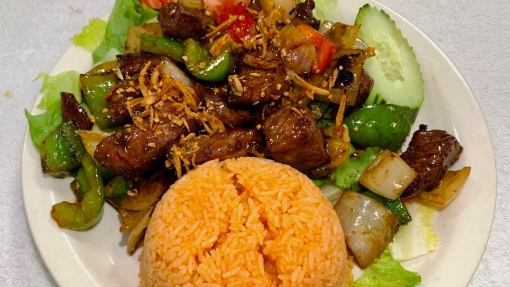 66. Cơm Đỏ Bò Lúc Lắc · Shaking Beef with Red rice