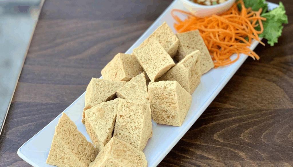 Crunchy Tofu · Fried organic tofu served with sweet sauce. Top with ground peanut.