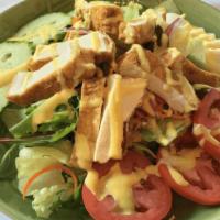 Thai Salad · A salad of lettuce, cucumbers, tomatoes, onions, egg topped with homemade honey mustard dres...