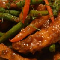 Choo Chee Catfish · Spicy Crispy catfish sautéed tasty Choo Chee paste with kaffir lime leaves, green beans and...