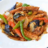 Pad Phed Catfish · Crispy catfish sautéed in spicy chili paste bamboo shoots, eggplant, onions, basil leaves a...