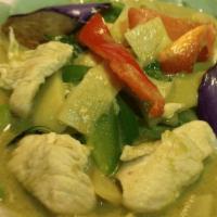 Green Curry  (Gaeng Kheaw Waan) · Eggplant, bamboo shoots, bell peppers and basil leaves in Thai green coconut milk curry.