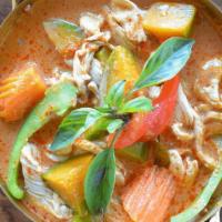 Pumpkin Curry · Chicken served in red curry with Kabacha pumpkin, bell peppers & sweet basil.