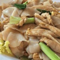 Chicken Noodles (Kwaytiaw Pad Gai) · Fresh wide rice noodles pan-fried with chicken, eggs, onions, mushrooms, lettuce, and black ...