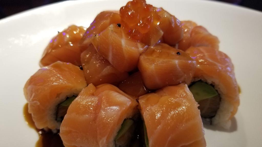 Salmon Lover Roll · In: salmon and avocado. Out: salmon, ikura, and wasabi sauce.