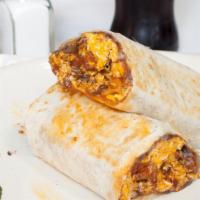 Beef &  potatoes  breakfast burrito · Tomatoes, caramezed onions eggs, cheese , salsa ,potatoes, avocado, sour cream wrapped with ...
