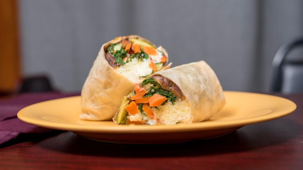 Veg breakfast burrito · Onions, bell peppers, garlic, tomatoes, spinach, potatoes 
Eggs cheese , wraped with flour tortilla