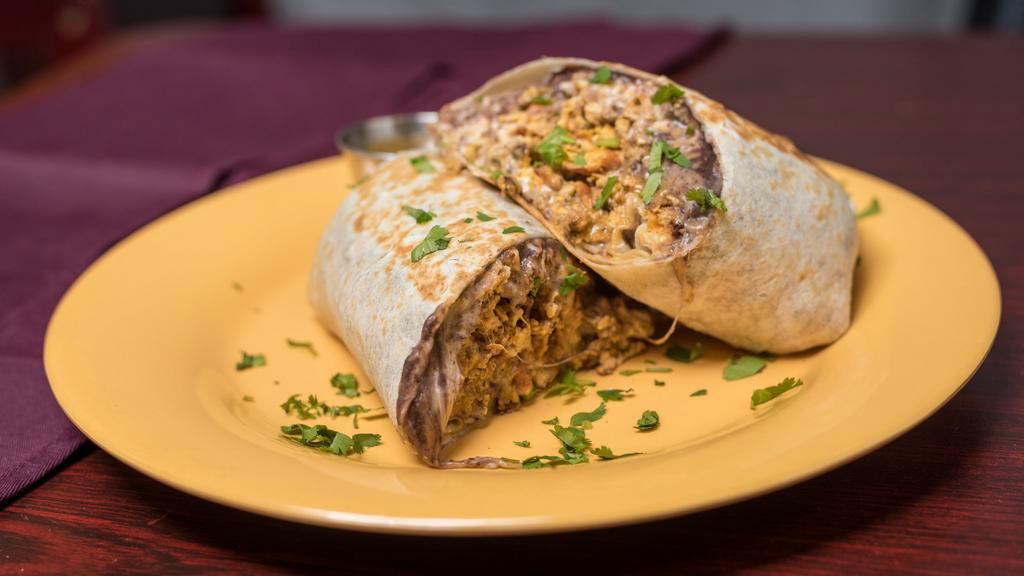 Regular burito · Four  tortilla  choice your meat , asada , chicken, salmon , shrimp rice ,pinto.beans ,pico de gallo