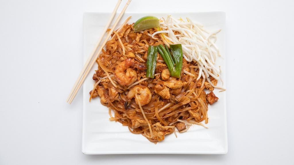 N6. Pad Thai · Chicken & Shrimp, rice noodles wok-fried with egg, tofu, bean sprouts, scallions, ground peanuts, and our homemade tamarind sauce.