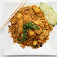 R5. Pineapple Fried Rice · Stir fried with egg, cashew nuts, raisins, onion, pineapple, tofu, pea & carrots, yellow cur...