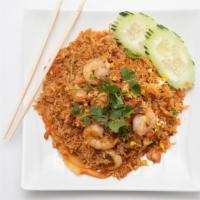 R6. Crab Meat &  Shrimp Fried Rice · King Crab meat and shrimp stir  fried with egg, onion, peas and  carrots.