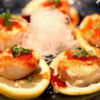 03. Parmesan Baked Scallops · Take more time than other items. Parmesan cheese complements the sweetness of four pieces of...