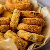  Breaded Fried Zucchini · Sliced Fried Zucchini 10to 12 pcs served with Ranch dressing