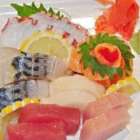 Sashimi Combo (12 Pieces) · Chef's special choice of fresh fish of the day.