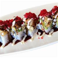 Warriors Roll · Unagi, cream cheese and tamago inside. Topped with avocado, soft shell crab, tobiko and spec...