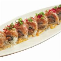 Salmon Snow Roll · Scallops with garlic sauce, tobiko, onion, snow crab, and minced salmon topping.