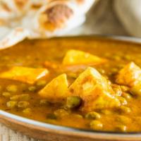 Mattar Paneer · Cubed farmer’s cheese and peas in special gravy.