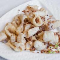 Salt & Pepper Calamari · Deep fried calamari seasoned with salt and pepper.