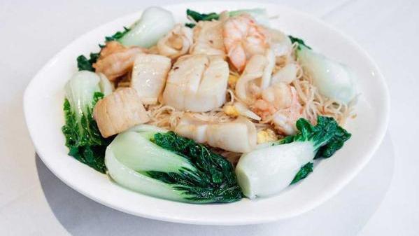 Pan-Fried Seafood Noodles · Mixed seafood tossed with fried vermicelli noodles in the house special x. O. Sauce. (does not include bok choy).