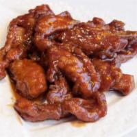 Kiang Ton Spareribs · Sautéed spareribs tossed in a tangy sweet and sour sauce.
