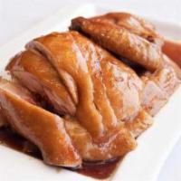 Soy Sauce Chicken (Half) · Steamed chicken served with a special soy sauce.
