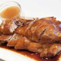 Roast Duck · Specially marinated duck roasted to a golden brown crispy skin.