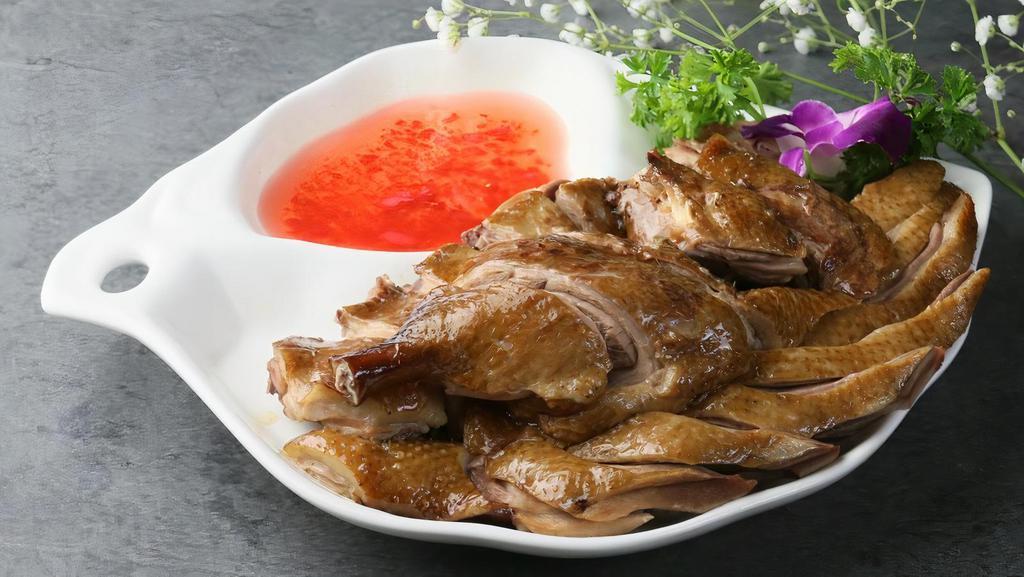 Soya Sauce Duck · Tender pieces of duck marinated in chef's special soy sauce.