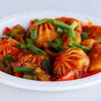 Handmade Veg Chilli Momo · Handmade tasty #dumplings (momos) cooked with chilli garlic sauce with fresh onion, red pepp...