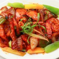 Shrimp Chilli-Premium · Indo-Chinese style Shrimp stir fried with soy, tomato and sweet and spicy sauce.