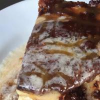 Seasonal Bread Pudding · Layered Brioche, Vanilla Crème Baked, Vanilla Butter Sauce