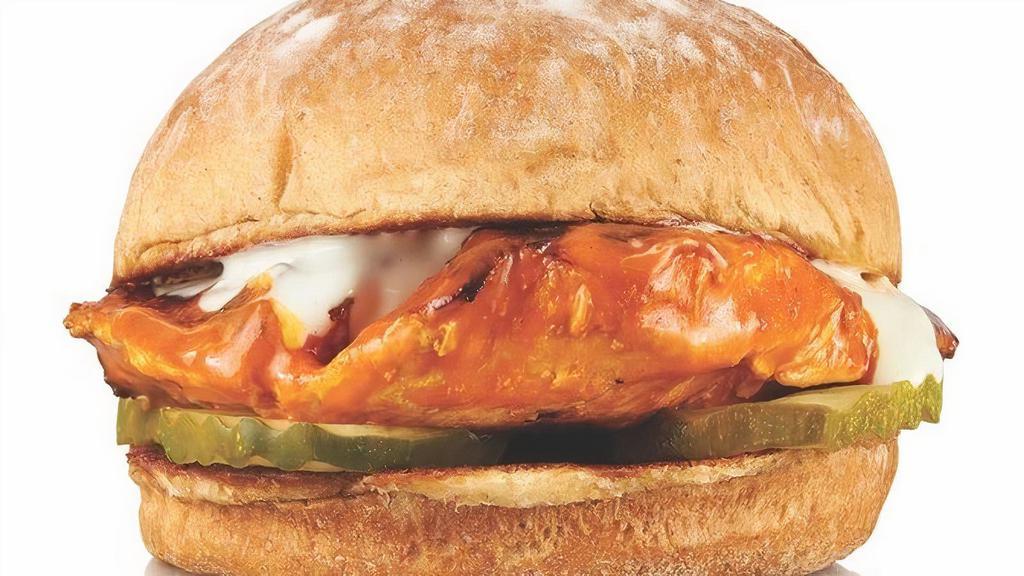 Grilled Buffalo Chicken Sandwich · Grilled Chicken Breast, Buffalo Sauce, Pickles, Blue Cheese Drizzle