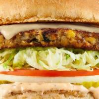 Ancient Grain Burger · Quinoa / Veggie Patty, Choice of Cheddar Cheese or Vegan Cheddar, Lettuce, Tomato, Onion, Pi...