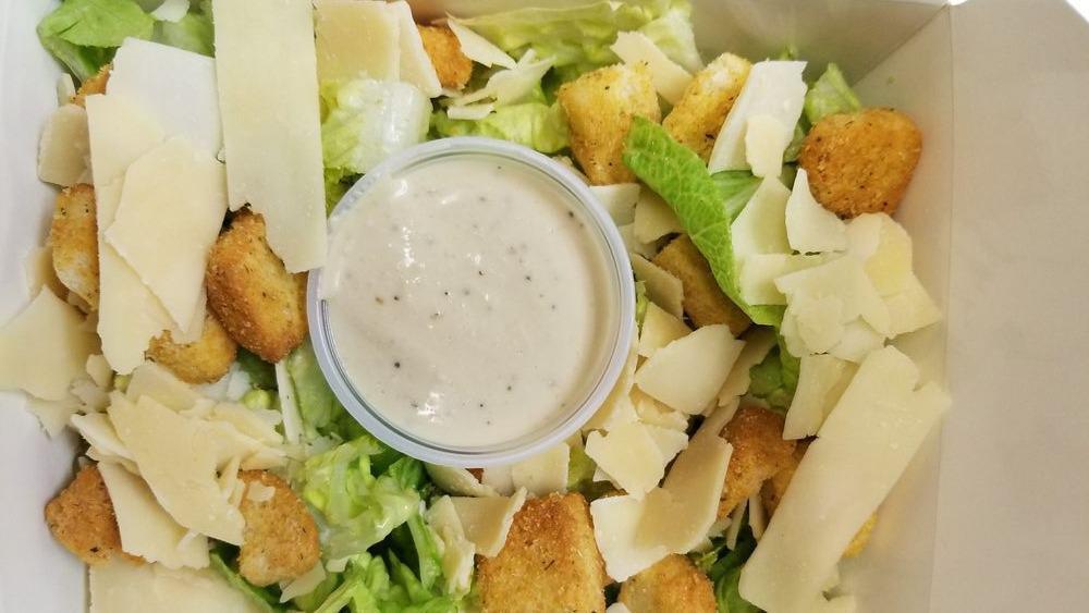 Caesar Salad · Caesar salad with parmesan cheese, croutons, and freaking good Caesar dressing on the side.