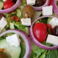 Greek Salad · A freaking good Greek salad with mixed greens, red onion, tomatoes, cucumber, black olives, ...