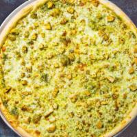 Cheeky Pesto Pizza · Pesto sauce, chicken, and tomatoes baked on a hand-tossed dough.