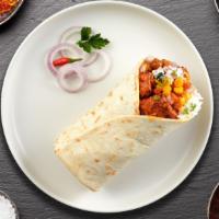 Tandoori Chicken Wrap · Tandoori chicken wrap in naan bread with cheese, onion, and Indian spices served with salad