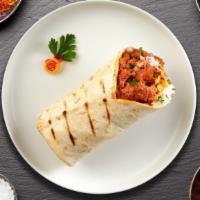 Tandoori Chicken Breast Wrap · Tandoori chicken breast wrap in naan bread with cheese, onion, and Indian spices served with...