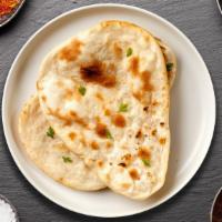 Plain Naan · All-purpose flour layered with butter baked in clay oven.