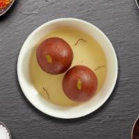 Gulab Jamun · Fried cottage cheese soaked in sweet syrup.
