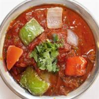 PANEER KADAI* · Paneer cubes and bell peppers cooked in roasted spices.