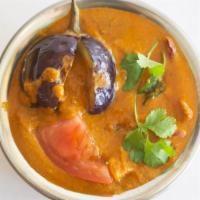 BAGARA BAINGAN* · Baby eggplant cooked with coconut-groundnut-sesame paste curry sauce.