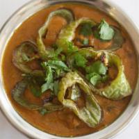 MIRCHI KA SALAN* · Long hot chili cooked in salan. Best with biryani.