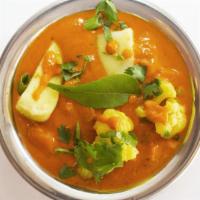 ALOO GOBI* · Potatoes and cauliflower cooked with herbs and spices.