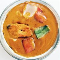 CHICKEN TIKKA MASALA* · Boneless pieces of chicken tikka cooked in onion and tomato sauce along with cream, smooth t...